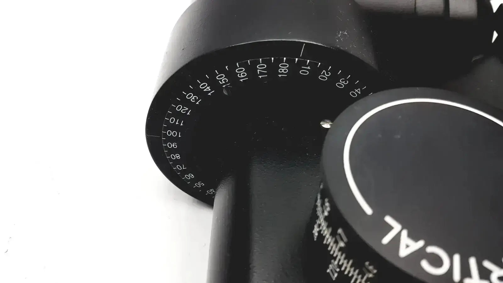 Black tactical scope with white degree markings and circular dial on lombart instrument keratometer model 12515