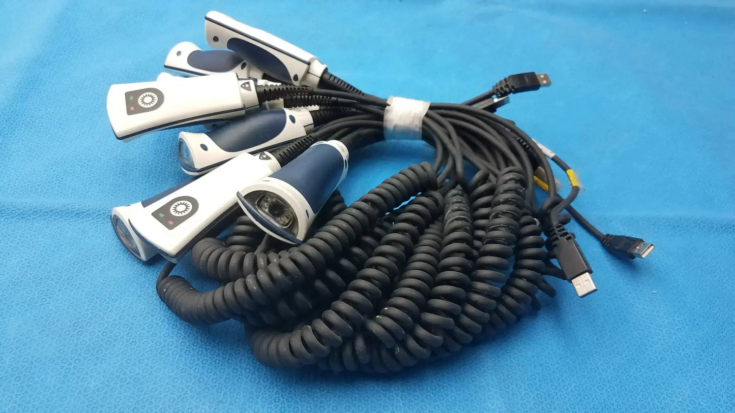 Set of five white and navy blue Jadak CBL-0144 handheld barcode scanners with coiled black cables for medical use