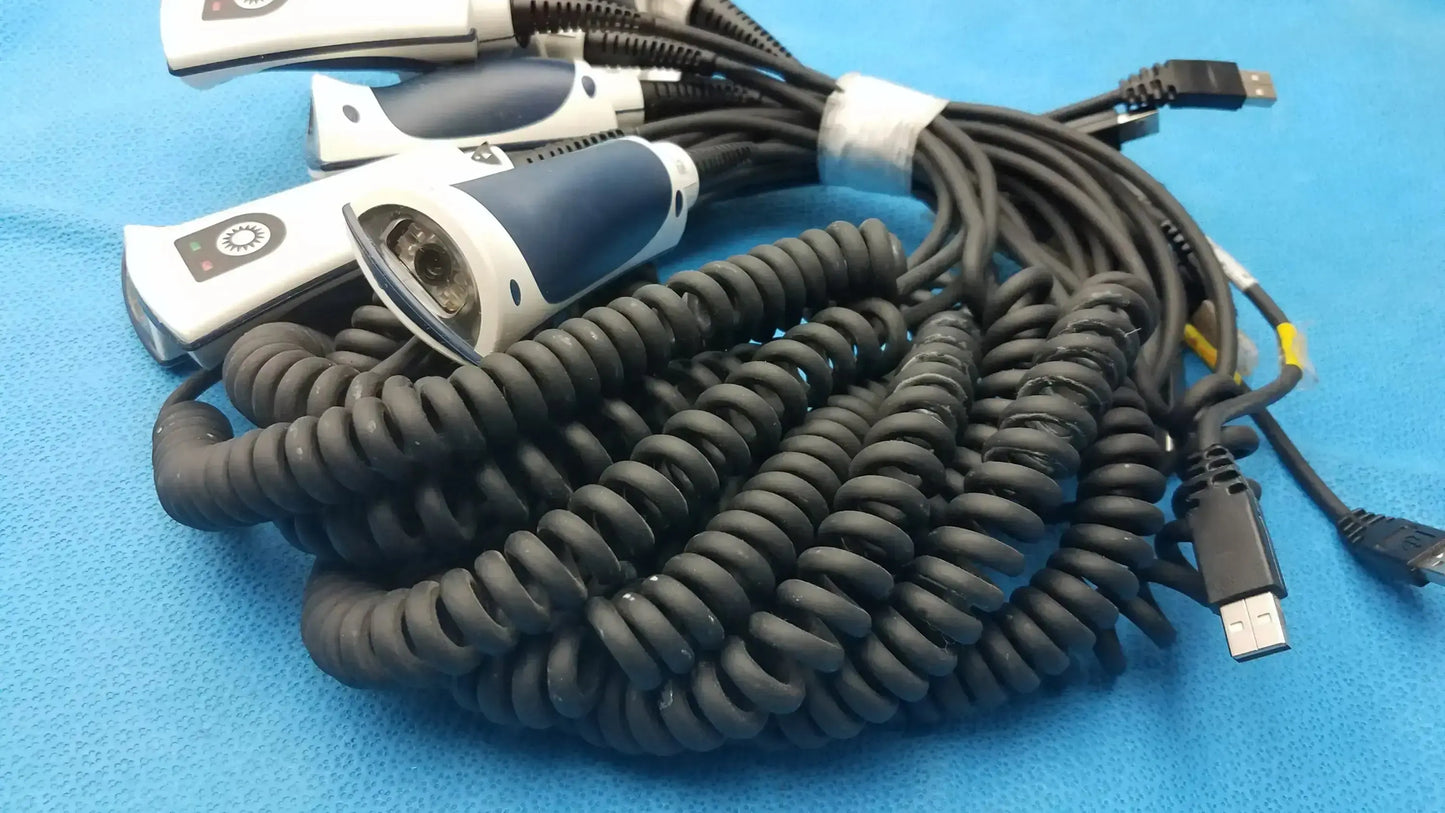 Lot of 10 Jadak CBL-0144 handheld barcode scanners with white and blue plastic body and black USB coiled cables