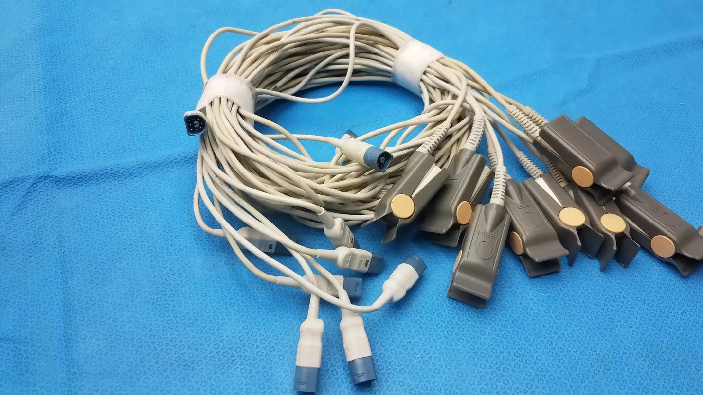 A bundle of beige medical ecg lead wires with gray clamps and blue connectors for adult finger clip sensor use