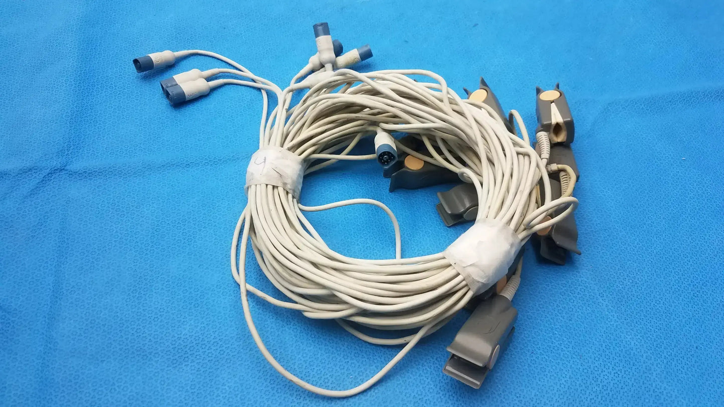 Coiled beige medical cable with multiple connectors and clips for philips m1196a adult finger clip sensor lot of 10