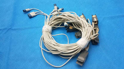 Coiled beige medical cable with multiple connectors and clips for philips m1196a adult finger clip sensor lot of 10