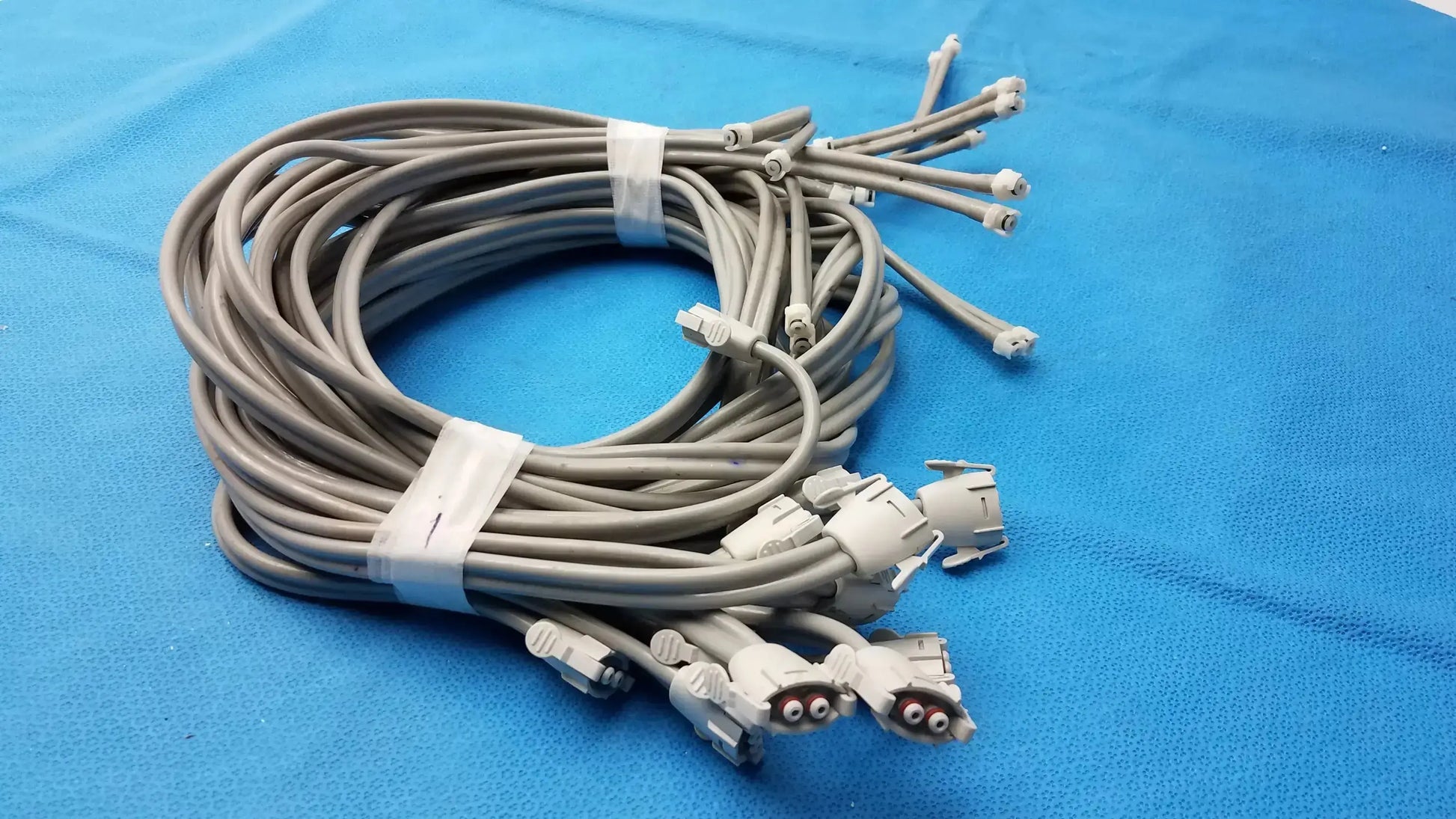 Lot of 12 gray nibp air hose fast double tube connectors with white plastic connectors and ties coiled neatly