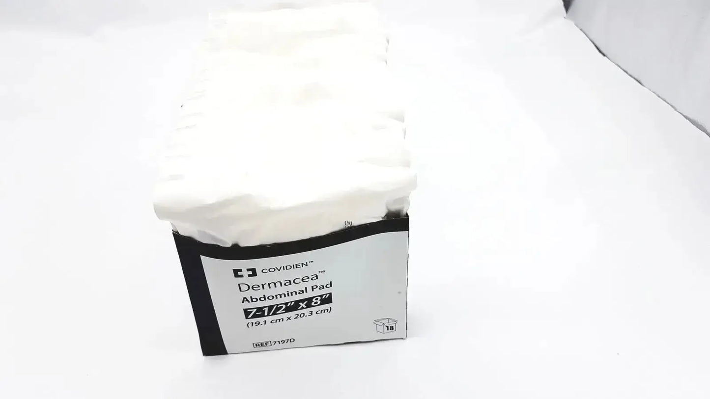A white soft textured covidien dermacea abdominale pad in a black and white box dermacea abdominale ref 7197d 7 12x8 inches