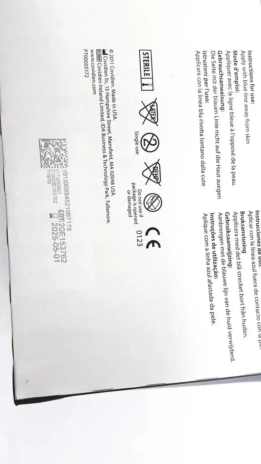 White paper label with black text and qr code on back of covidien dermacea abdominale ref 7197d 7 1/2x8 product lot of 18
