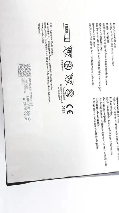 White paper label with black text and qr code on back of covidien dermacea abdominale ref 7197d 7 1/2x8 product lot of 18