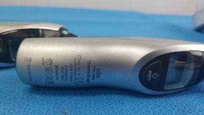 Silver thermapen pro infrared thermometer with black buttons included in lot of 2 braun pro 4000 medical equipment for reuse medical use