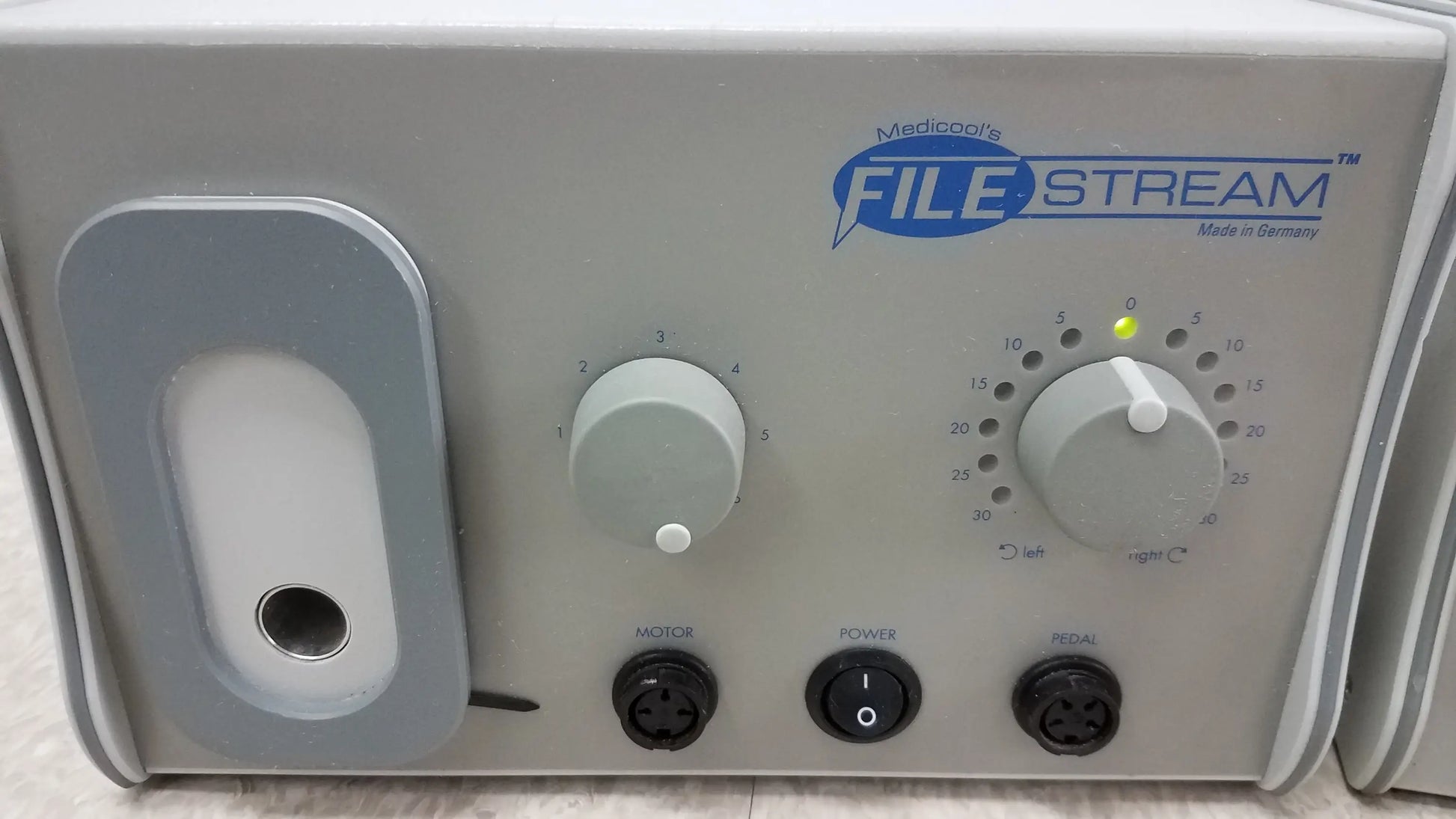 Gray medicool filestream dental handpiece control unit with two rotary dials and three ports for reuse medical equipment