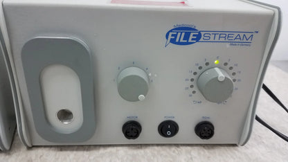 Gray medico file stream ii podiatry drill control unit with two gray knobs and black power ports back side reuse medical equipment
