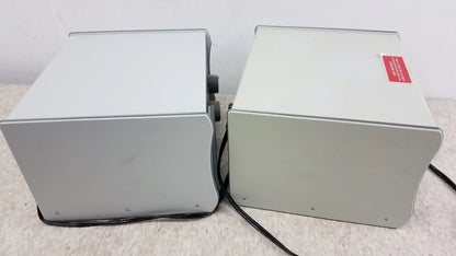 Two gray metal power supply units with black cables for reuse medical equipment stream ii podiatry drill