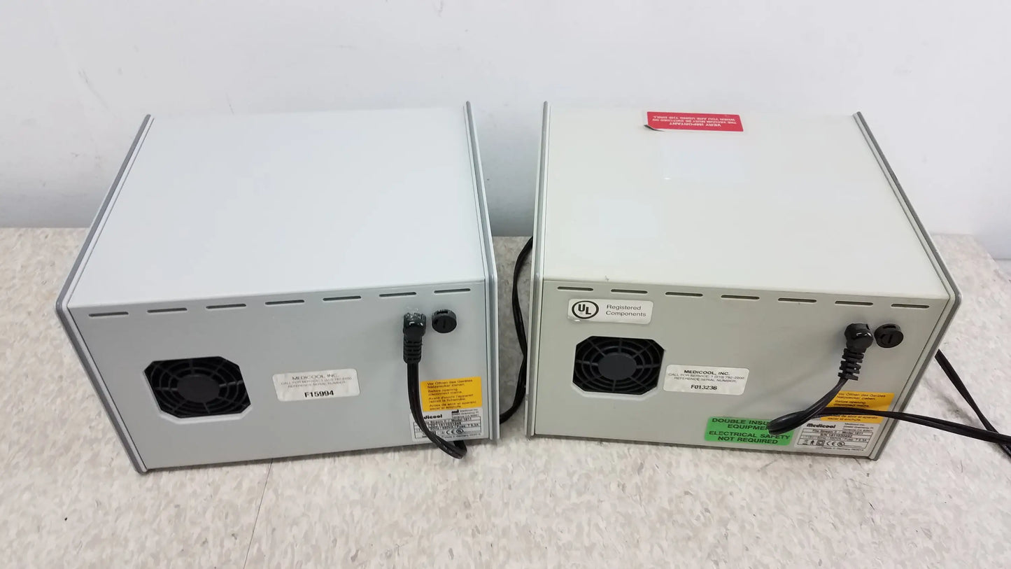 Two beige medicool 1811 file stream ii podiatry drills with black ventilation grilles and power cords shown from back side