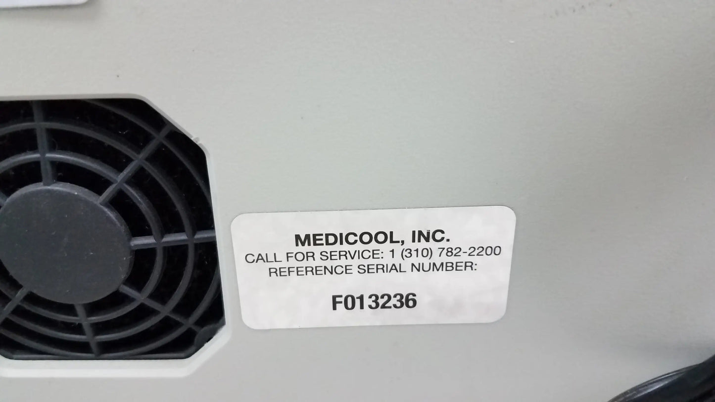 White rectangular medicool inc label with service info on light gray lot of 2 stream ii podiatry drill medical equipment