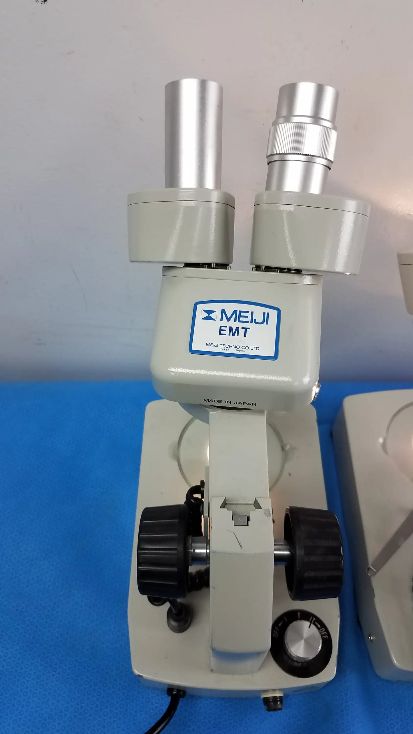 Lot of 2 meiji techno emt-1 stereo microscopes with dual eyepieces gray body medical equipment for detailed observation