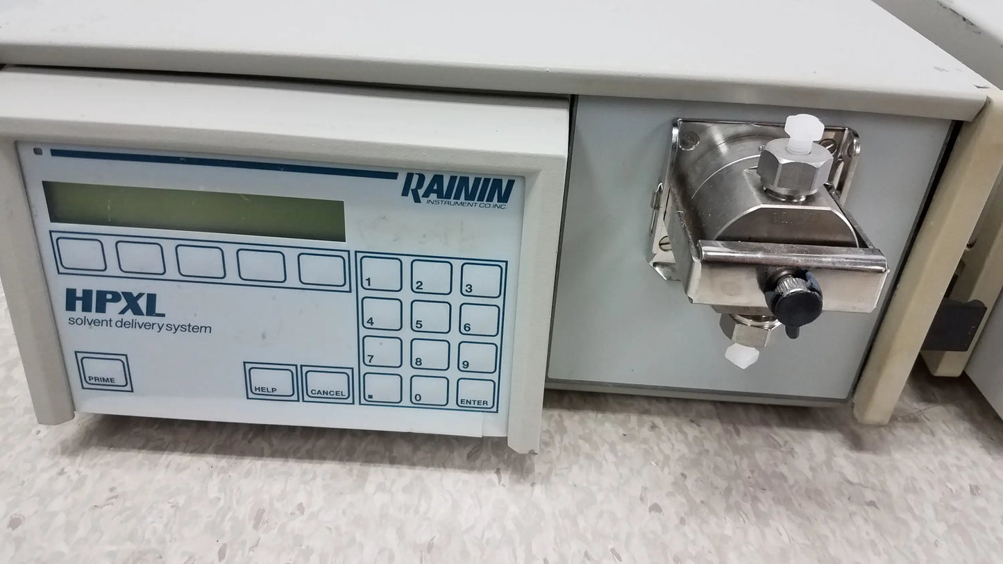 Lot of 2 rainin HPXL solvent delivery systems with digital display keypad and metallic pump assembly for pre owned medical equipment sale
