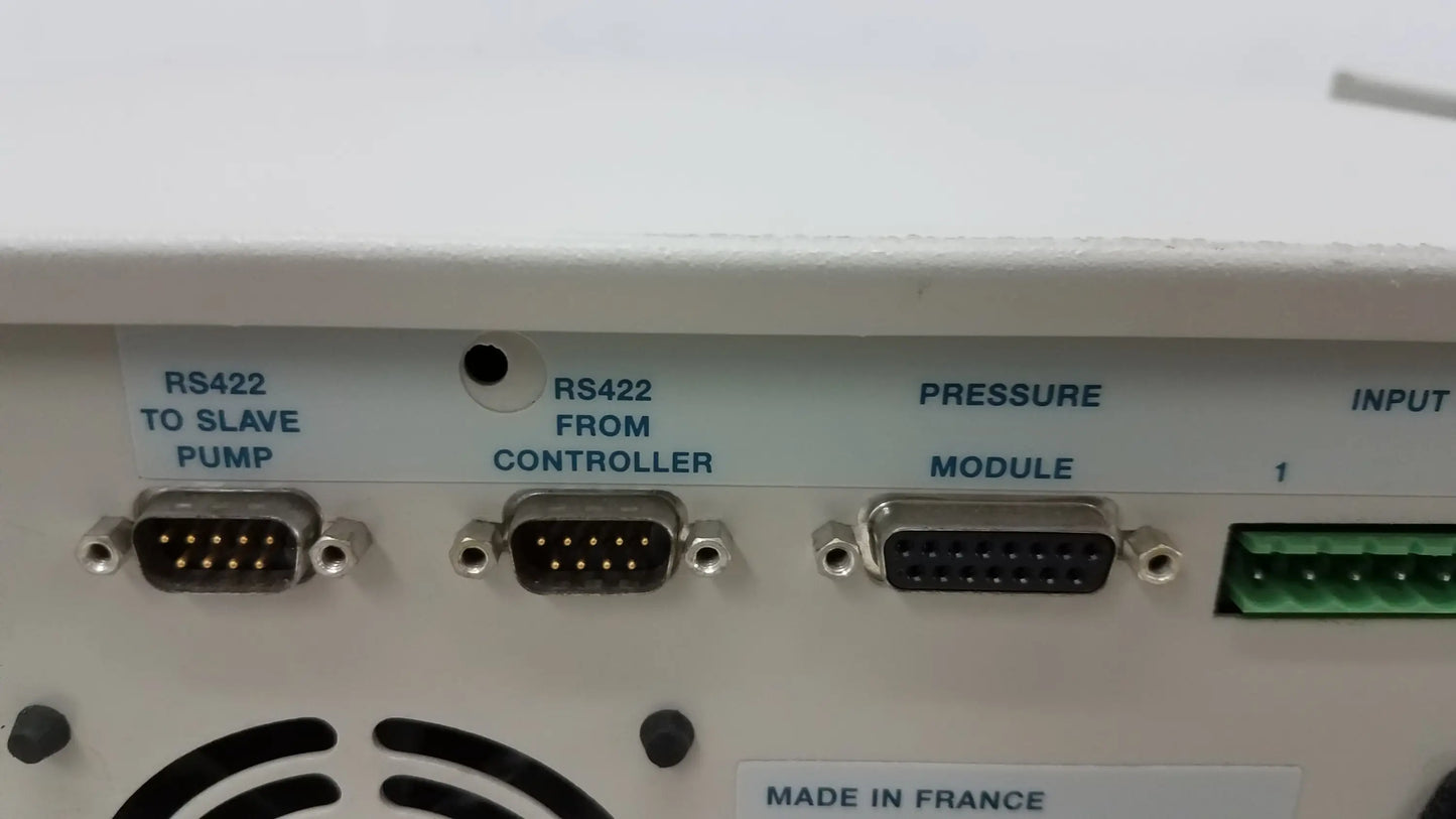 White industrial control panel with three black rs422 serial ports and one green input connector for used medical equipment for sale