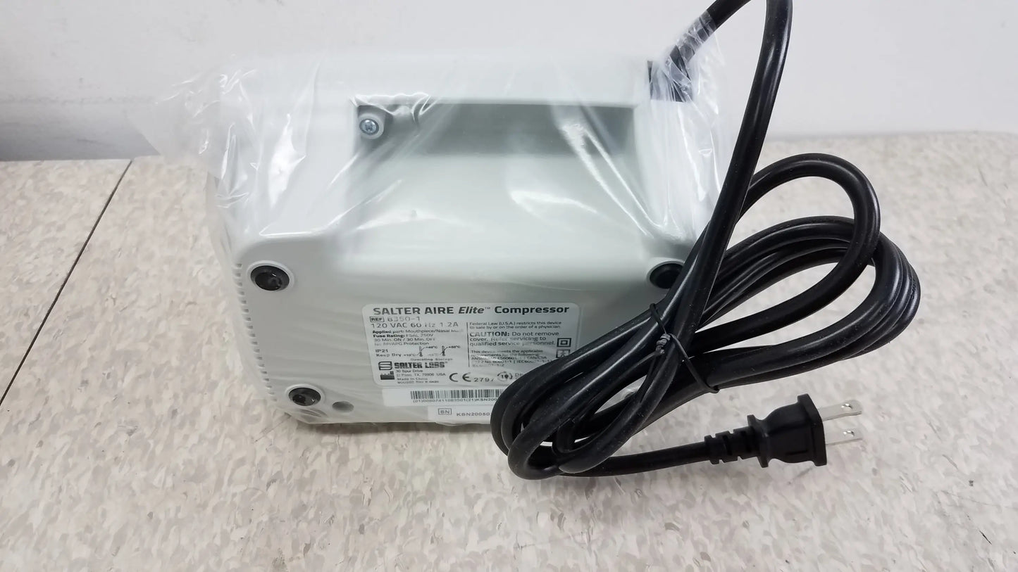 White plastic Salter AIRE Elite compressor nebulizer with black power cord for buy used medical equipment sale