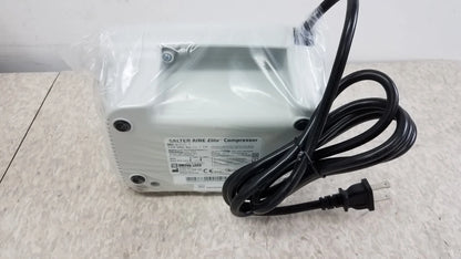 White plastic Salter AIRE Elite compressor nebulizer with black power cord for buy used medical equipment sale