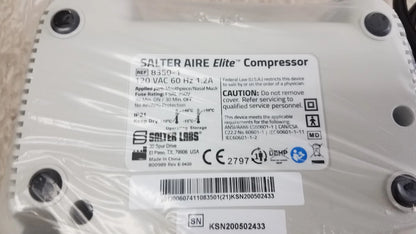 White plastic Salter AIRE Elite compressor with black screw holes and label showing specs for pre owned medical equipment sale