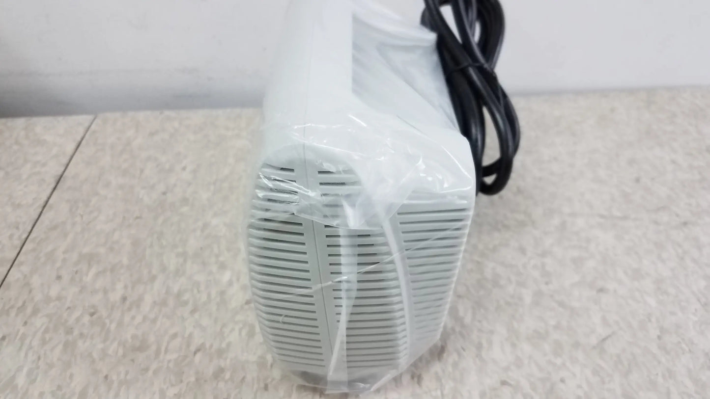 White plastic Salter AIRE Elite compressor nebulizer wrapped in plastic with black power cord pre owned medical equipment for sale