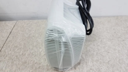 White plastic Salter AIRE Elite compressor nebulizer wrapped in plastic with black power cord pre owned medical equipment for sale