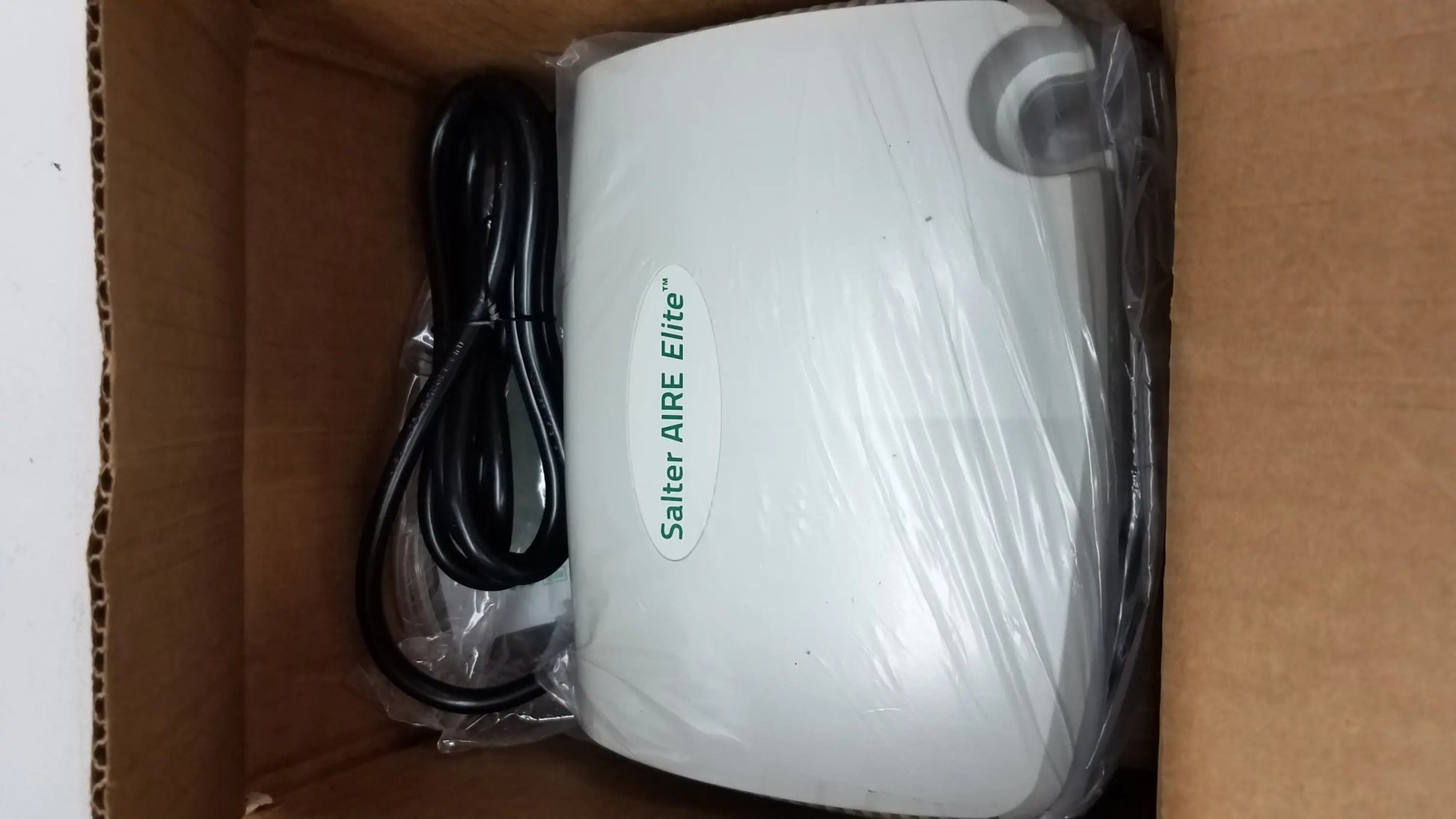White salter aire elite air purifier with sleek rounded design and black power cord for buy used medical equipment