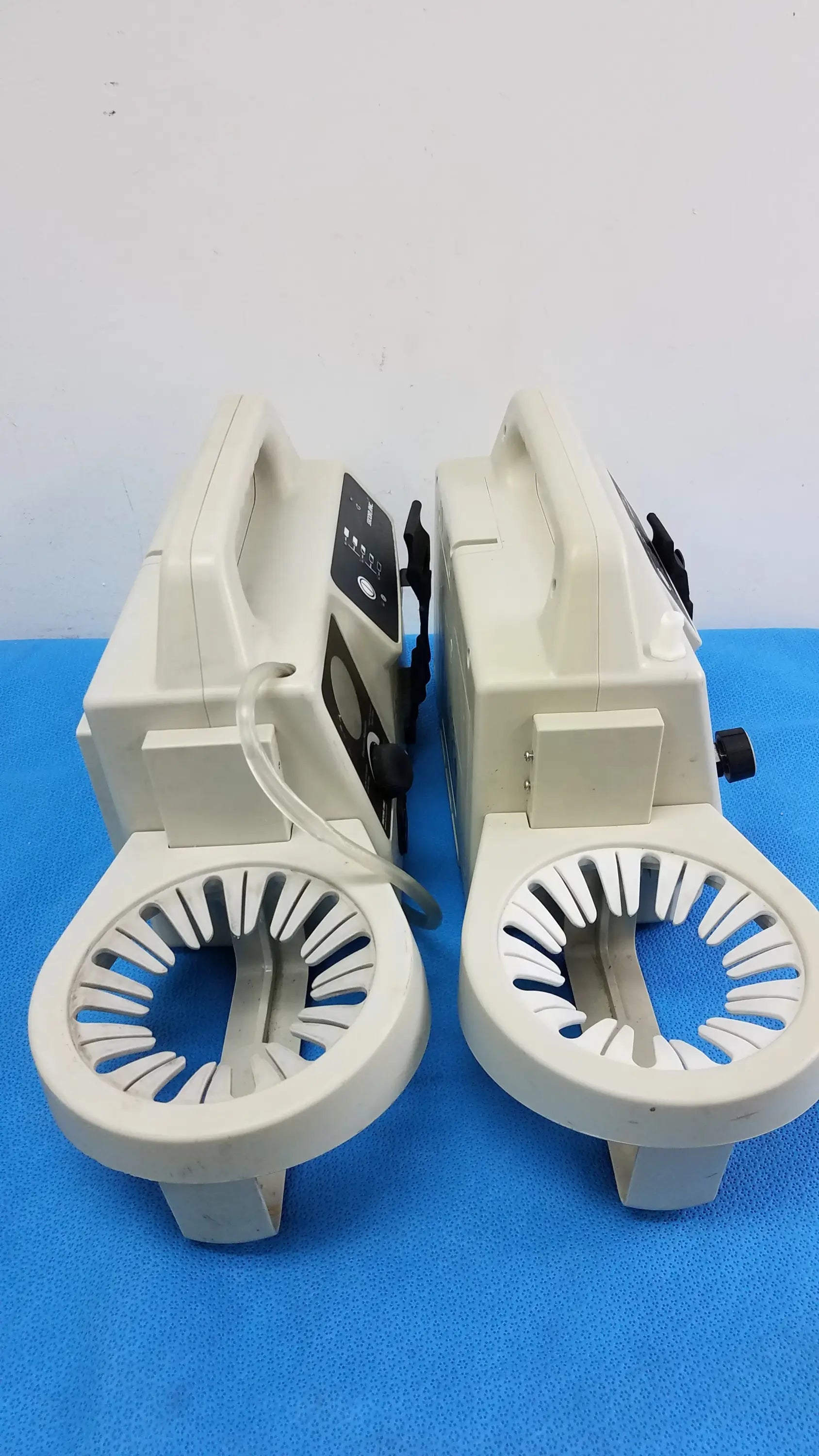 Lot of 2 beige sscor 2314 duet portable aspirators with circular slotted bases and control panels medical equipment