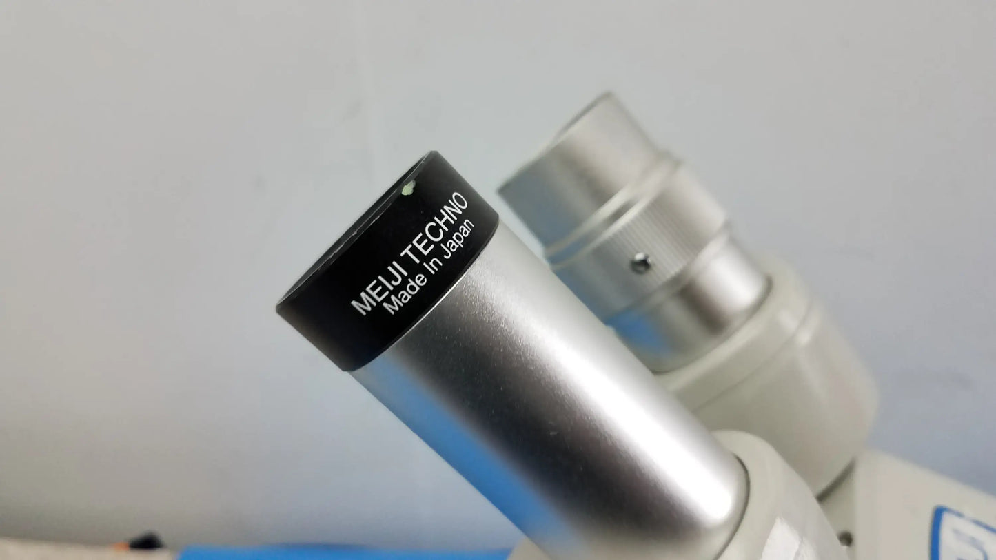 Silver metallic eyepiece with black ring labeled meiji techno made in japan for stereo inverted binocular microscope lot of 2