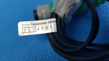 Lot of 2 black coiled stryker catheter connector cables with gray stryker sustainability solution label for medical equipment reuse