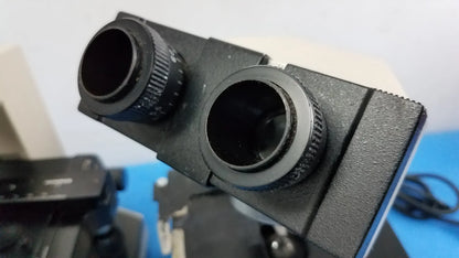 Black dual eyepiece microscope head with textured focus knobs for reuse medical equipment in wesco and olymus ch-2 lab microscopes