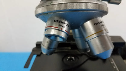 Silver Olympus microscope objective lenses with blue accents and Japan engraving for reuse medical laboratory equipment