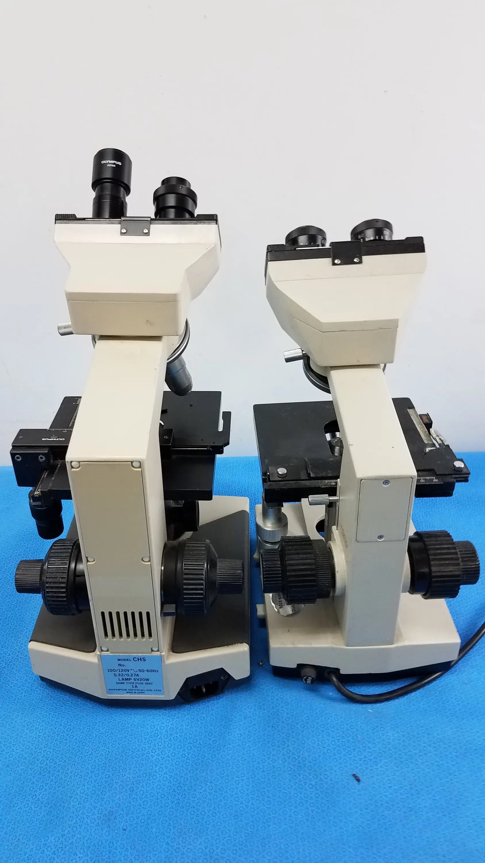 Lot of 2 wesco and olymus ch-2 beige and black compound microscopes with dual eyepieces for reuse medical equipment