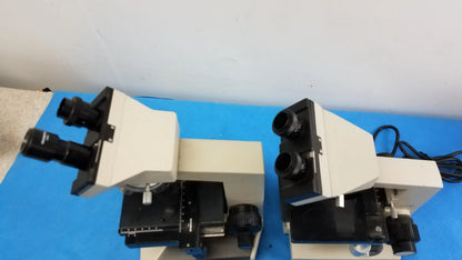 Lot of 2 beige and black wesco and olymus ch2 compound microscopes with dual eyepieces for reuse medical equipment