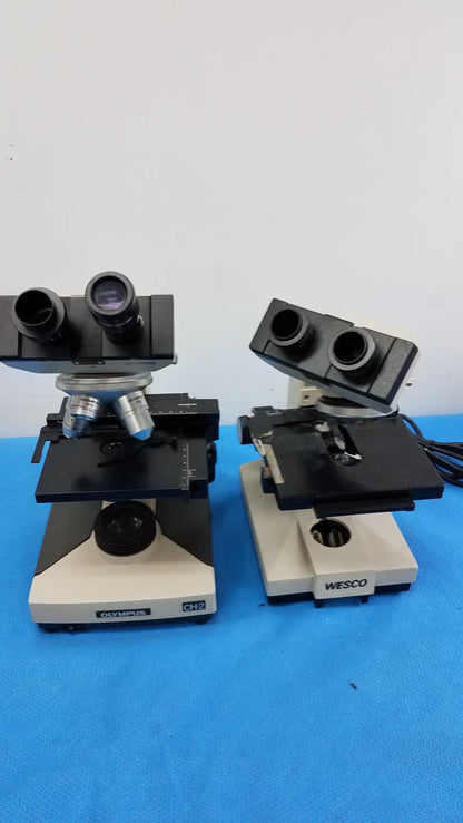 Lot of 2 black and cream-colored olympus ch2 and wesco compound microscopes for reuse medical equipment