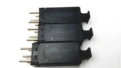 Lot of 3 black plastic 5 pin solid state protector modules with metallic pins and molded lever tabs