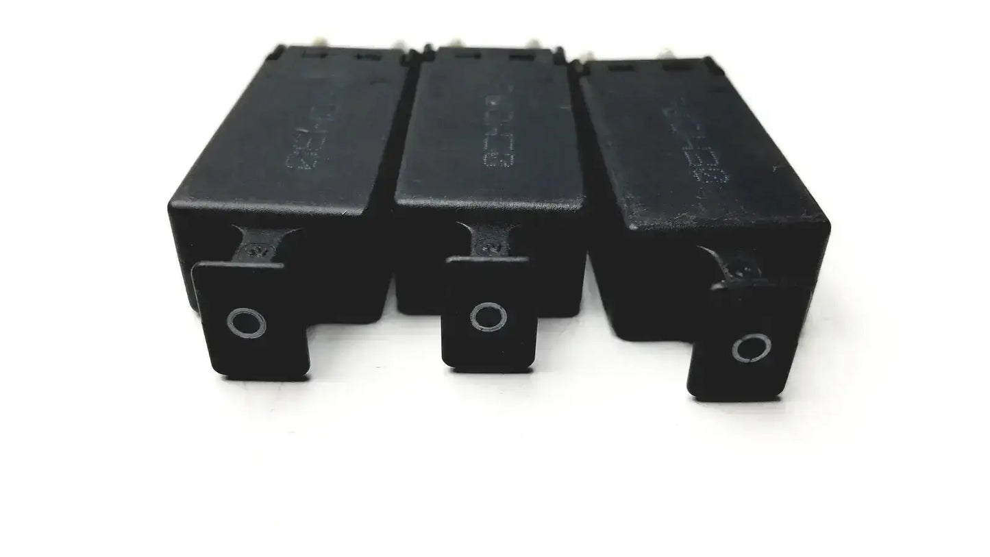 Lot of 3 black rectangular 5 pin solid state protector modules with silver circular accents for automotive use