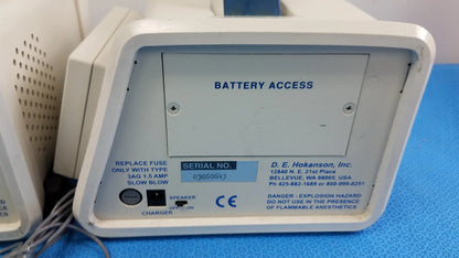 Back side of white plastic battery access panel with blue text and serial label on hokanson md6vr chart recorder medical equipment