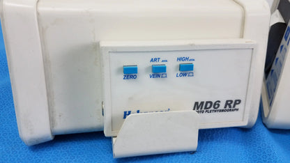 White plastic medical equipment hokanson md6vr chart recorder with blue-labeled control buttons for plethysmograph functions
