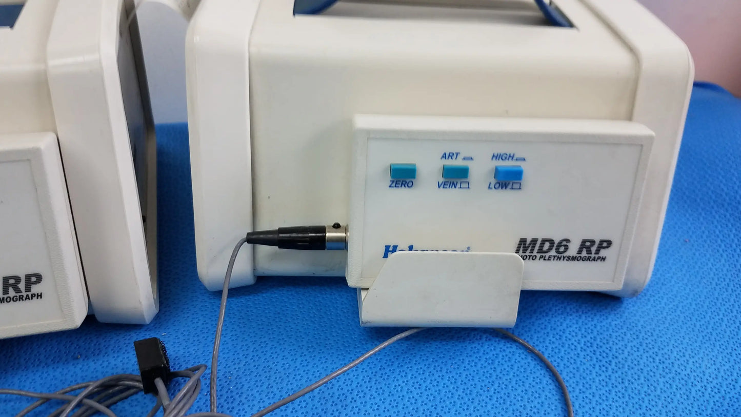 White plastic medical equipment labeled md6 rp photo plethysmograph with blue buttons and cable for hokanson md6vr chart recorder