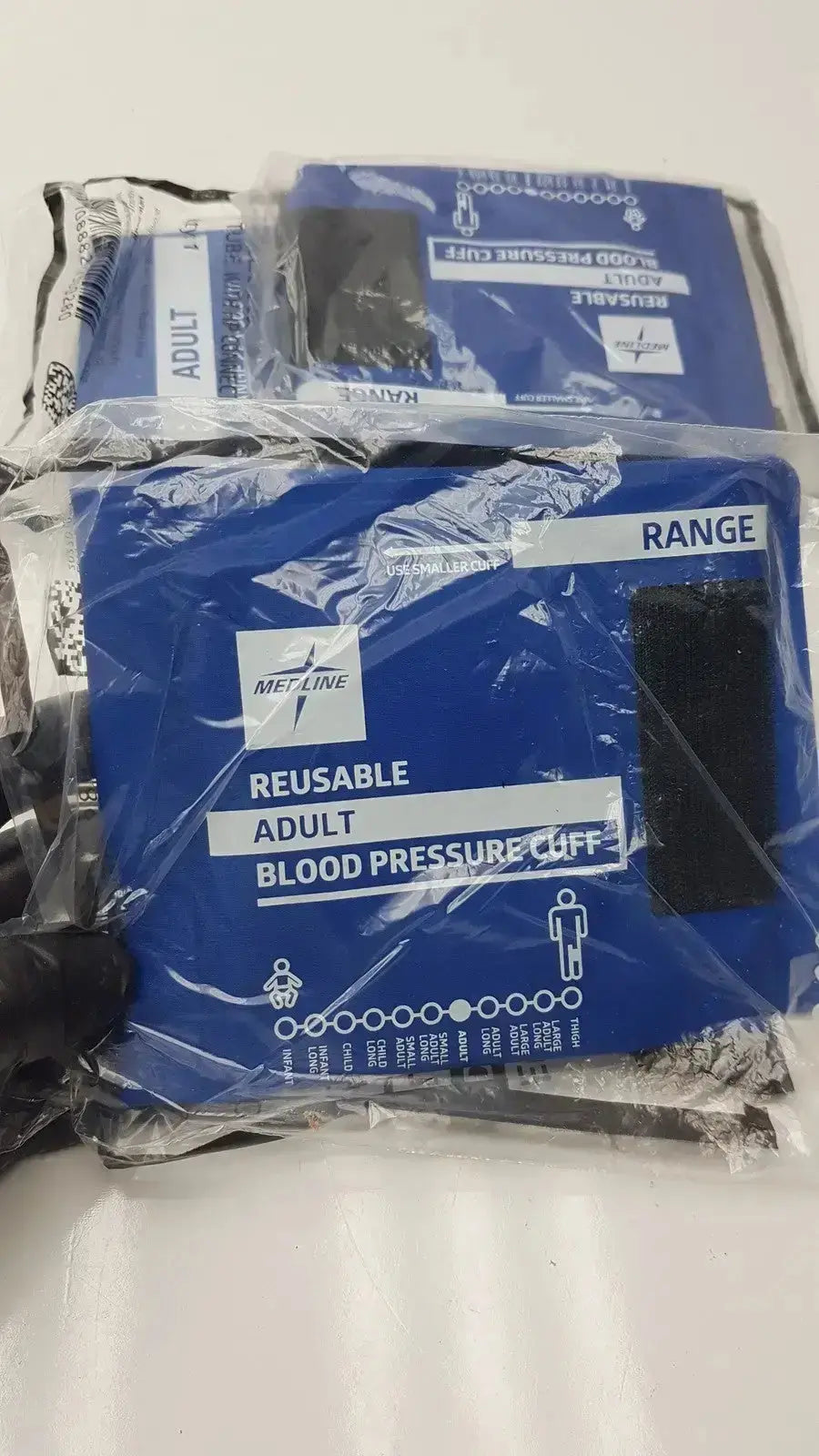 Blue medline reusable adult blood pressure cuff in clear plastic packaging for pressure cuff size 27.5 to 36.5 cm