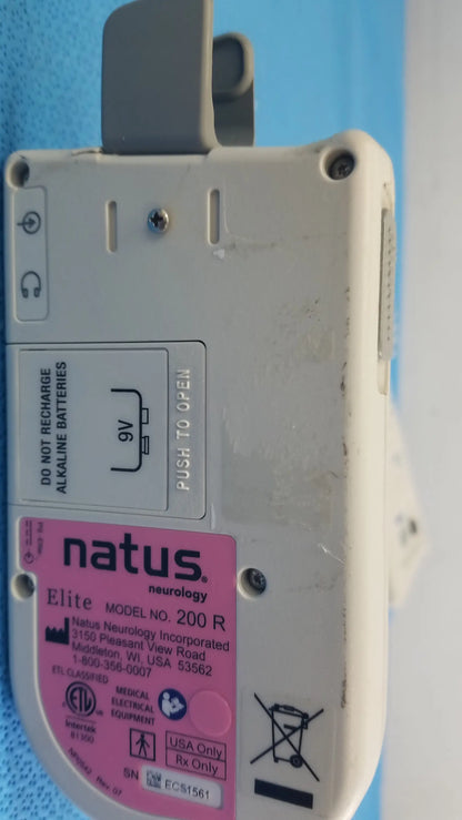 White plastic handheld doppler with pink natus label model number for reuse medical equipment natus neurology elite device