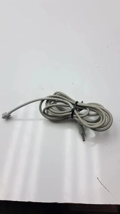 Gray coiled audio cable with 3.5mm jack and rca connector tied with black zip tie for philips nibp air hose m1599b 7d adult