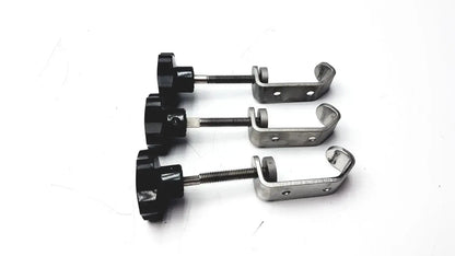 Black plastic knob with threaded metal shaft and silver stainless steel u-shaped bracket for tube slot pipe clamp