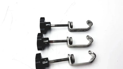 Black plastic knob with threaded metal rod and u-shaped stainless steel clamp for tube slot pipe fixture I-beam clamp