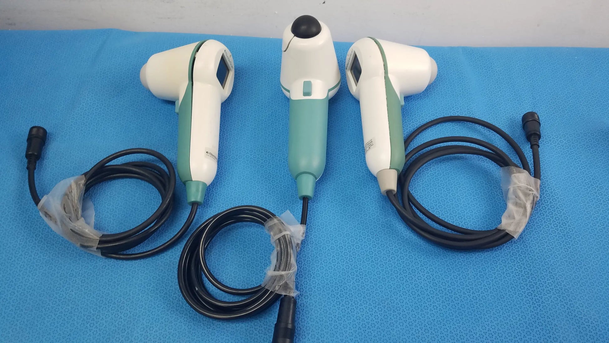 Lot of 3 verathon bladderscan handheld ultrasound probes in white and teal with ergonomic design for reuse medical equipment
