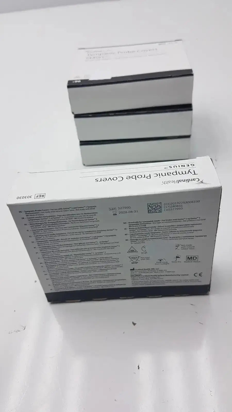White cardboard box of cardinal health genius tympanic probe covers with black text and qr code for ear thermometer use