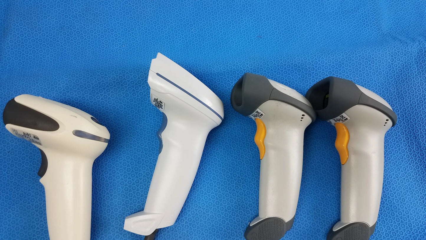 Lot of 4 laser barcode scanner readers with white and gray bodies and orange or black triggers for medical equipment use