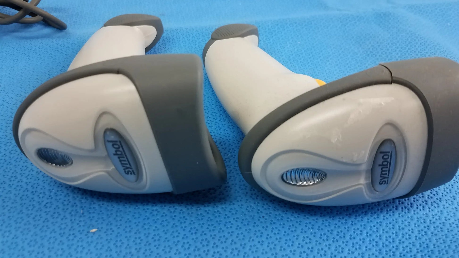 Lot of 4 laser barcode scanner readers with two gray and white ergonomic handheld scanners for reuse medical equipment