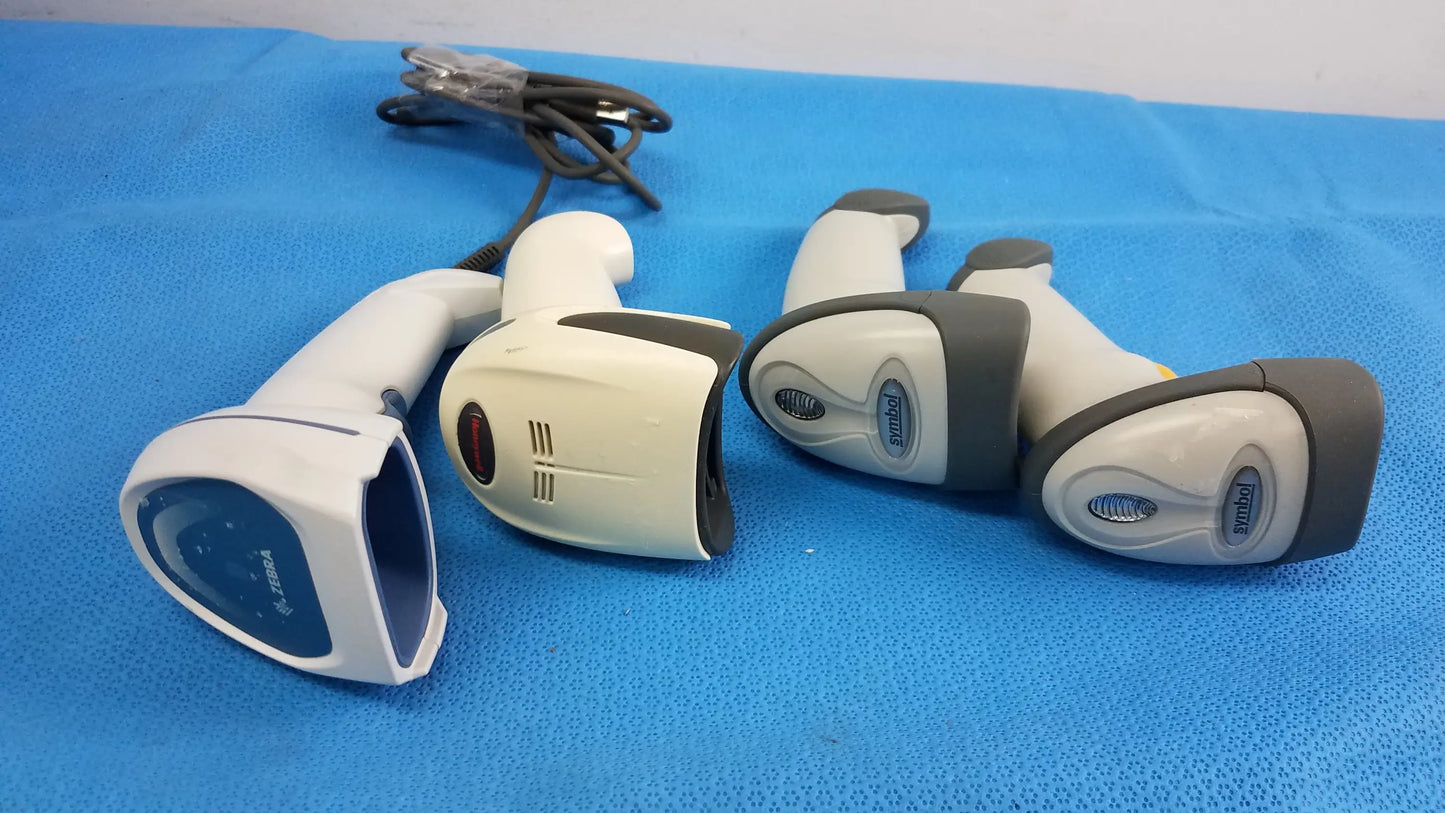Lot of 4 white and gray handheld laser barcode scanners with blue accents suitable for reuse medical equipment applications