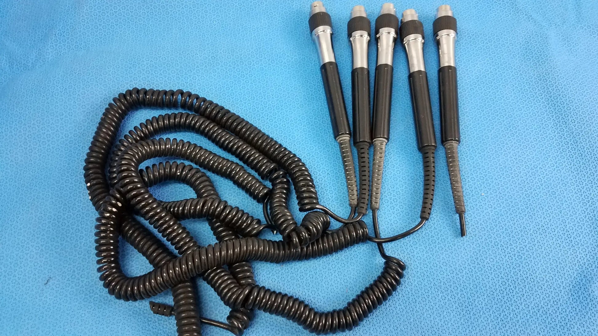 Lot of 5 black coiled cord and handle assemblies with silver-tipped probes for wall transformer reuse medical equipment