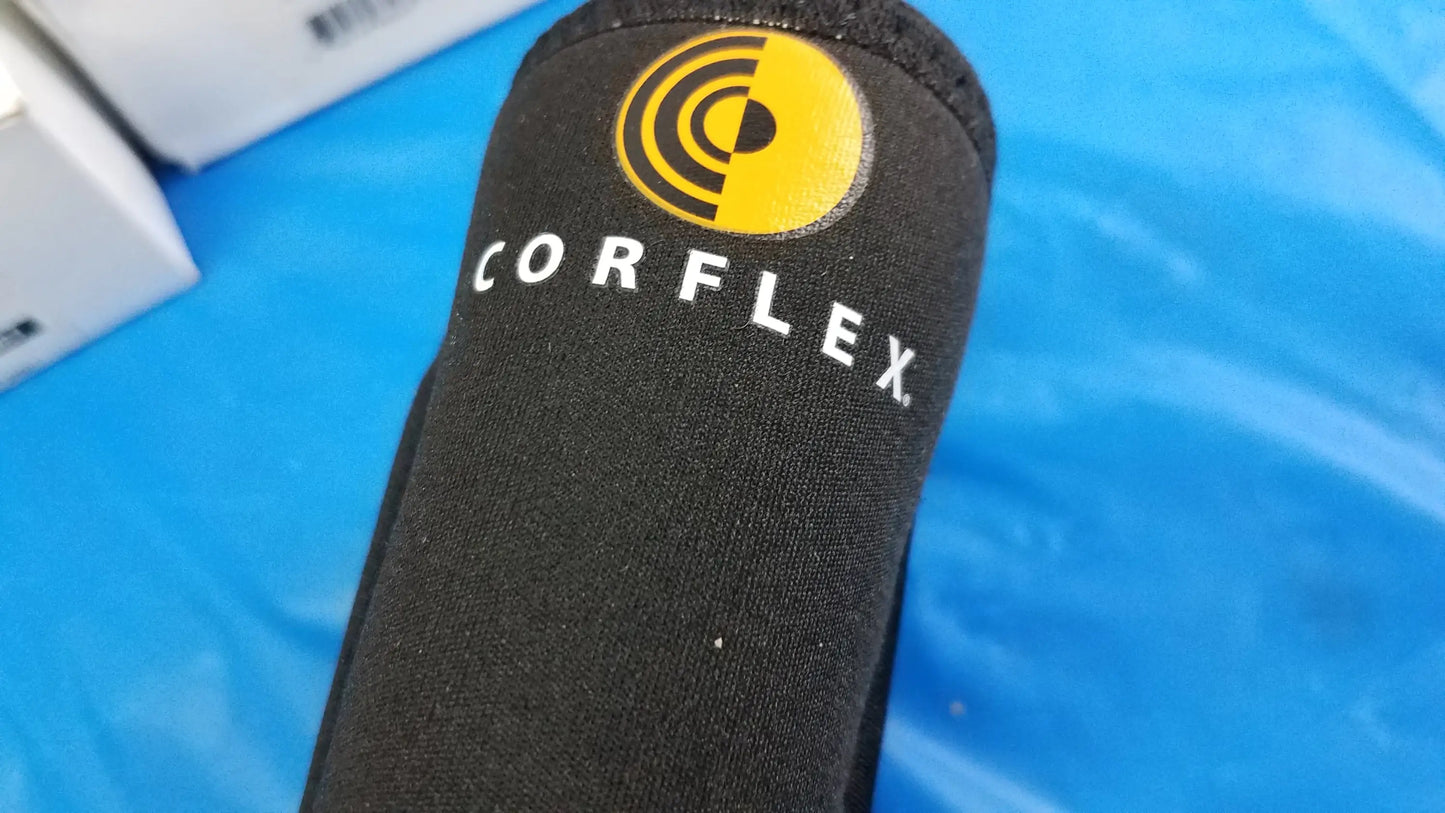 Black corflex cooltex knee sleeve with yellow logo and white lettering designed for reuse medical equipment support